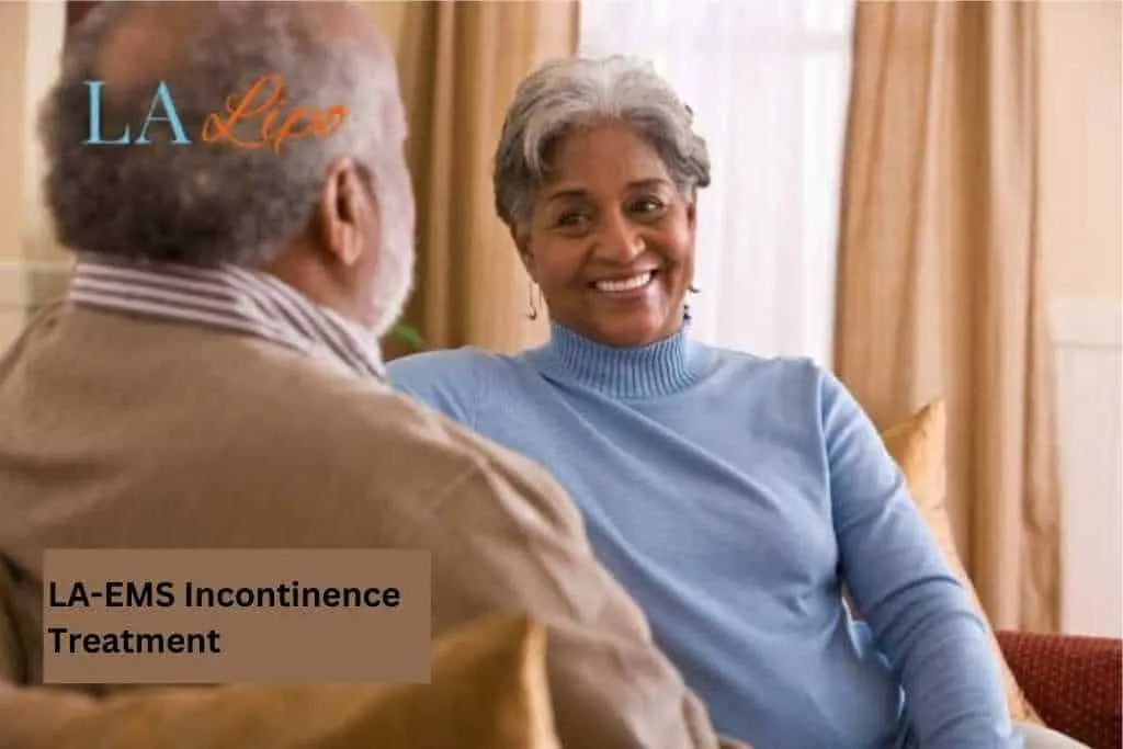 Couple sat smiling at each other - LA-EMS treatment Ruislip Manor