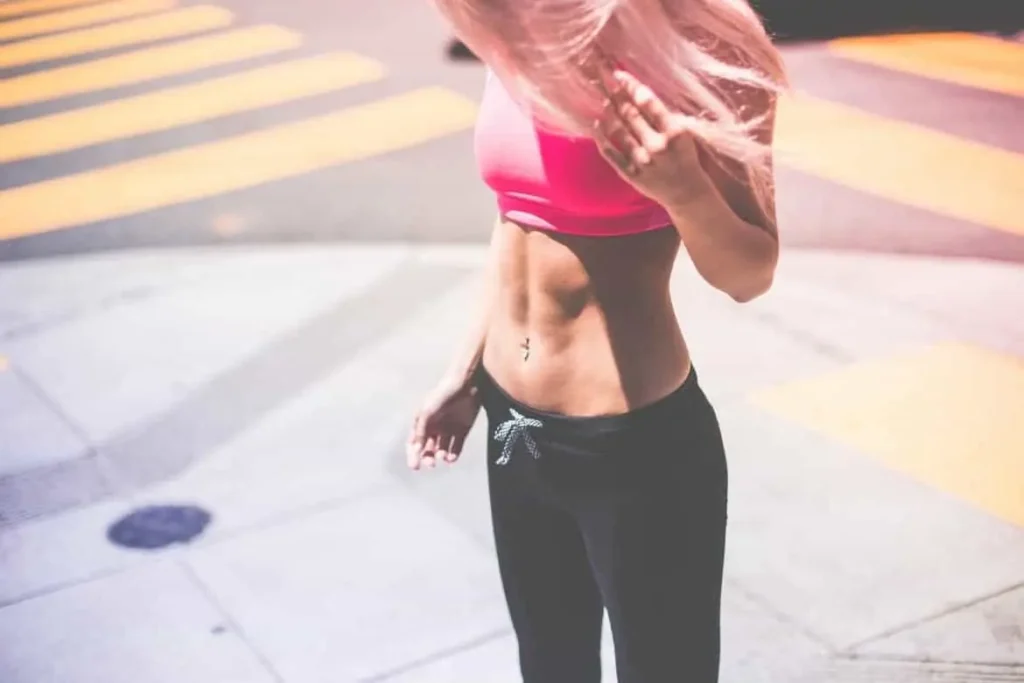 Woman with toned stomach after LA-EMS Body Sculpting Treatment Ruislip Manor
